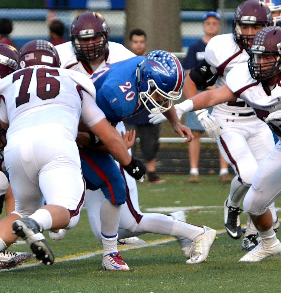 The Rocky River defense held Bay running back Nick Best in check for nearly the entire game. Photo – Ryan Kaczmarski