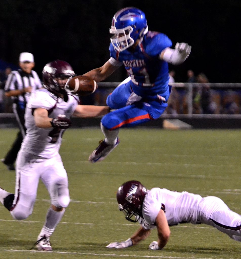 Bay senior wide receiver Cole Gergye took the high road for a reception in Friday's loss to Rocky River. Photo – Ryan Kaczmarski