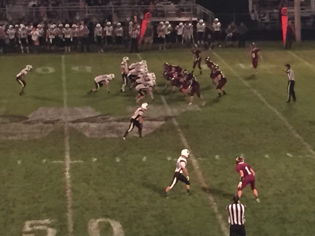 The Raiders come up to the line of scrimmage for a play - Photo by Matt Loede