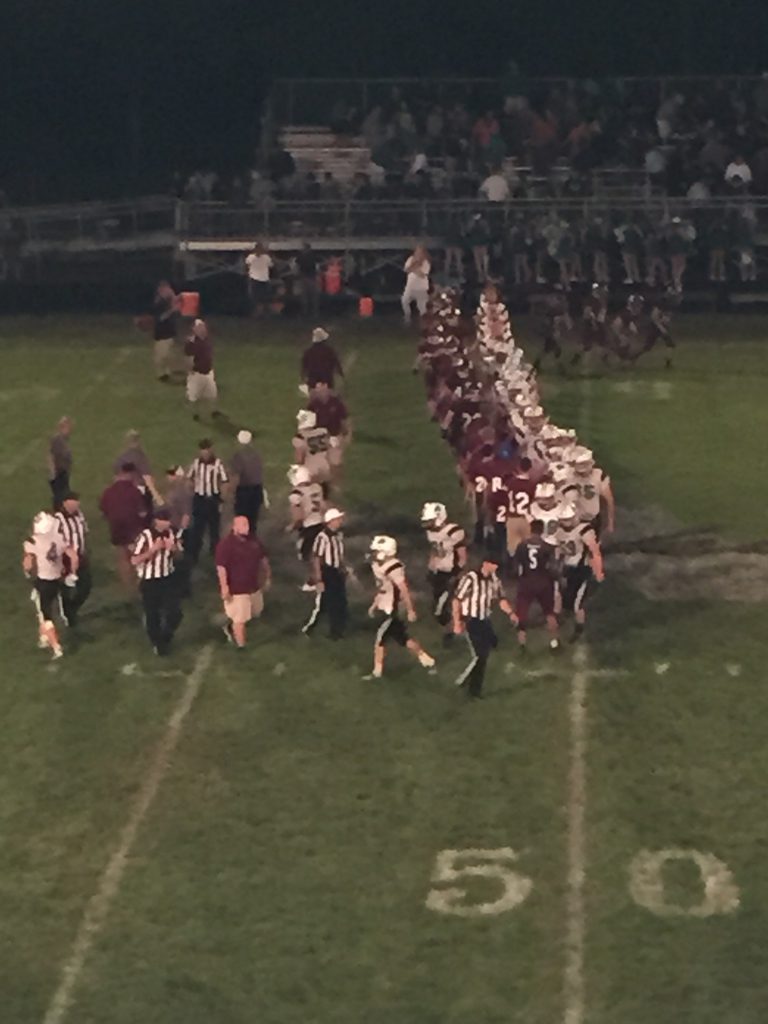 The two teams shake hands following the game - Photo by Matt Loede