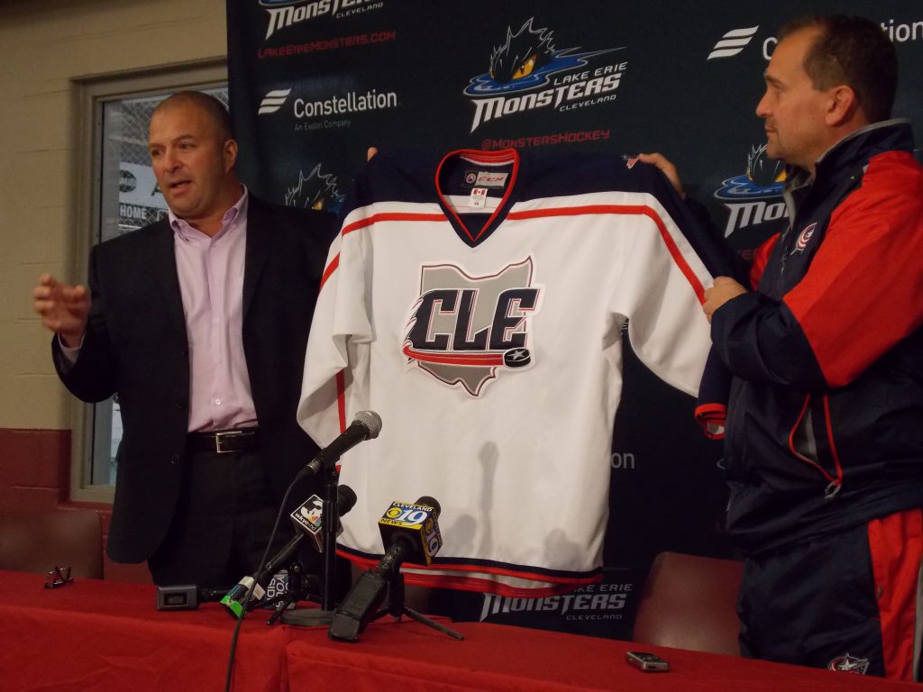 Blue Jackets coach Todd Richards shows off the new Jersey (Photo by Matt Loede)