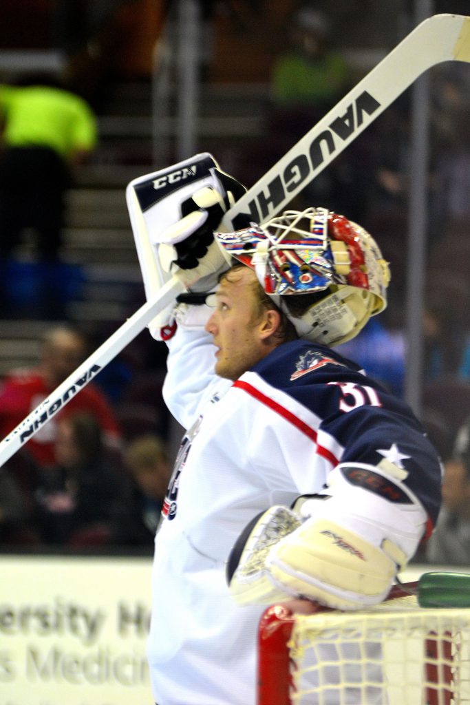 Monsters goalkeeper Anton Forsberg takes a quick breather while he waits for a face off in his defensive zone. Photo by Ryan Kaczmarski