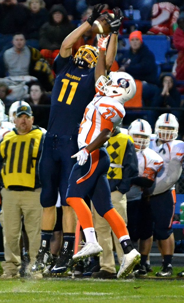 Olmsted Falls senior wide receiver Kevin Meehan went up for a jump ball, but Berea-Midpark's Desmond Sallee made the big defensive play by knocking the ball out of his clutches.