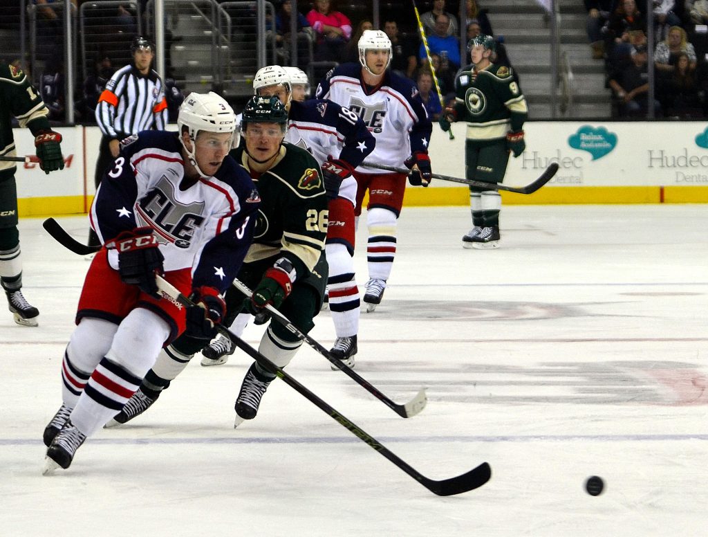 Monsters defenseman Dillon Heatherington streaks down the ice, pushing the puck into the Wild's defensive zone. Photo by Ryan Kaczmarski