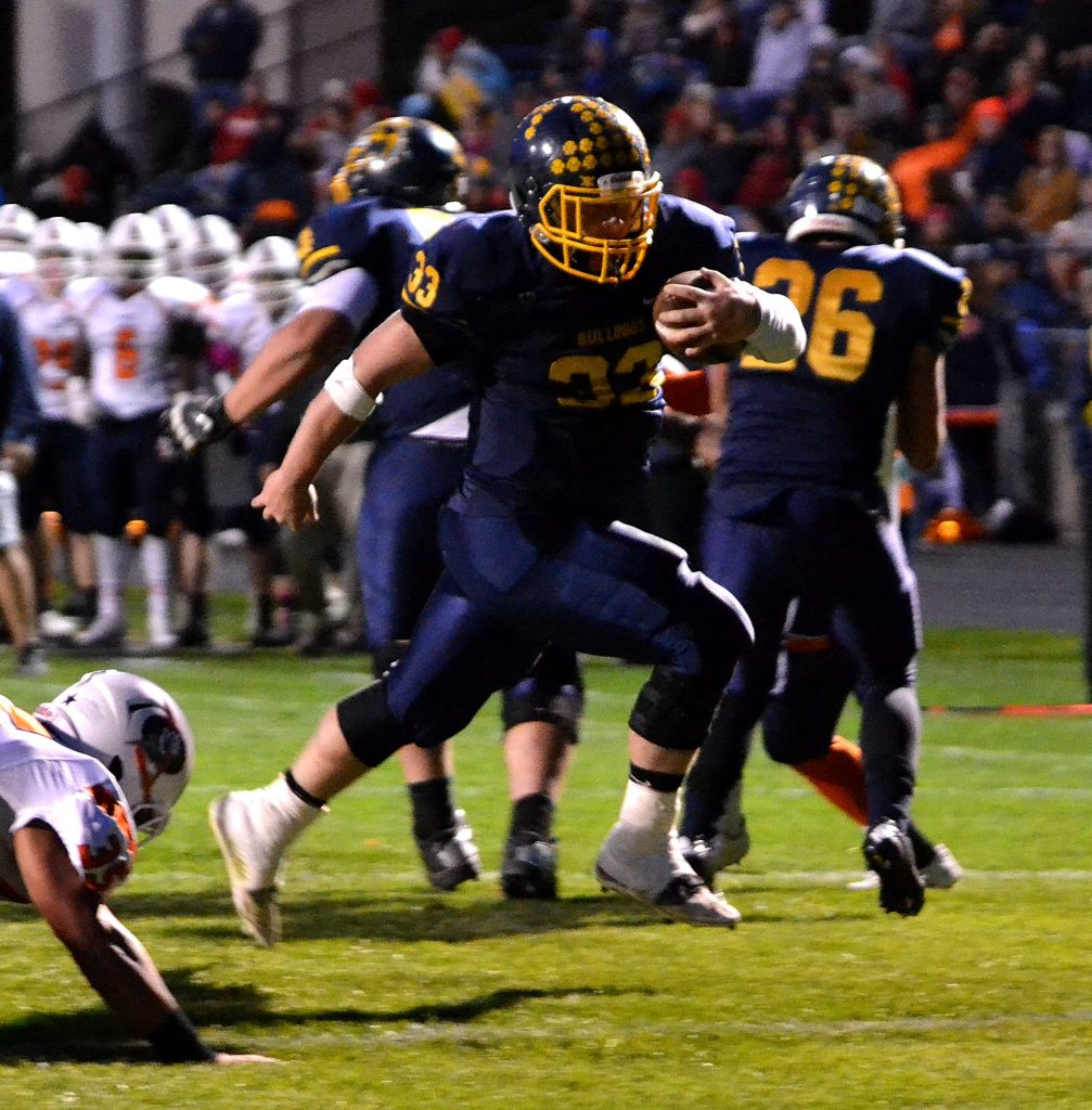 Olmsted Falls junior running back Spencer Linville ran in a 3-yard touchdown ealry in the game before leaving with a shoulder injury.