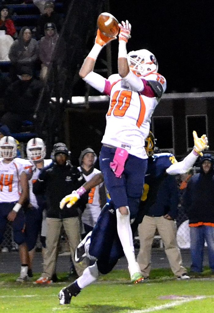 Berea-Midpark's 6-6 wide receiver Brett Swinnerton went up high for a long reception at Olmsted Falls Friday night.