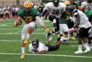 St. Edward senior running back Cole Gest, left, is 25 yards shy of 2,000 rushing yards this season.